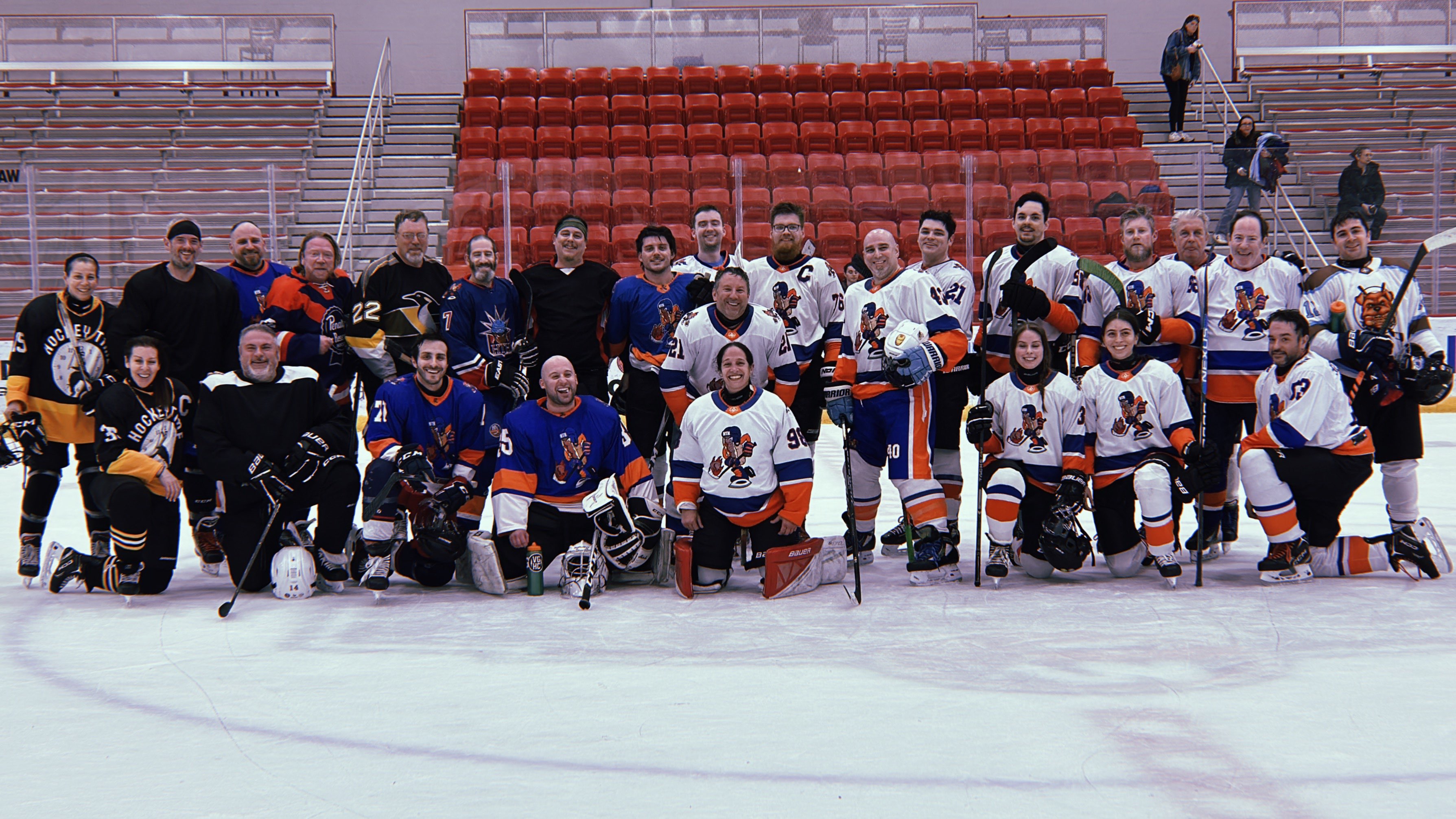 Long Island Hockey players together on the ice.